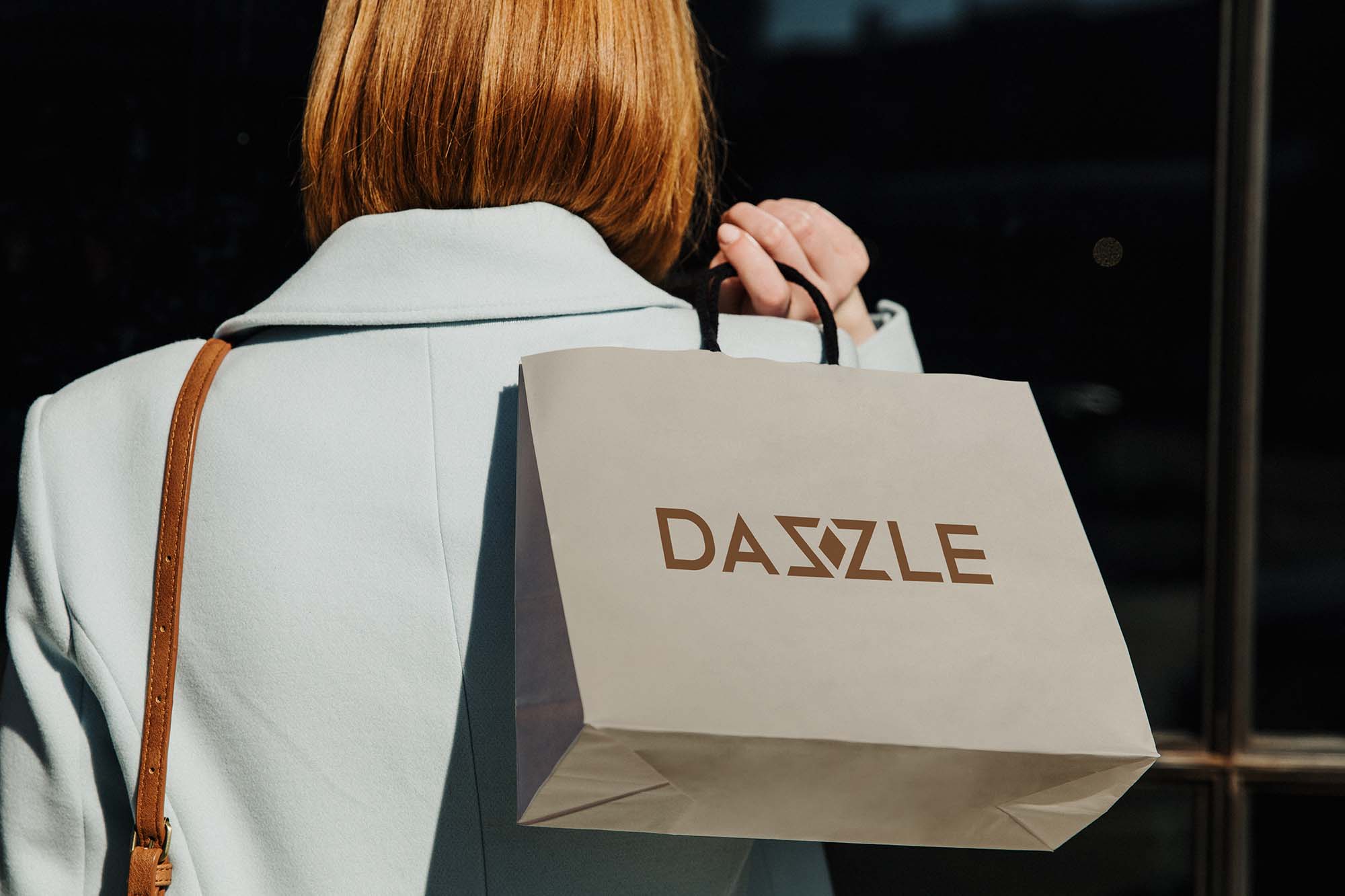Shopping bag on model created by Wotbbi for Dazzle, a luxury womenswear brand, as part of its fashion branding.