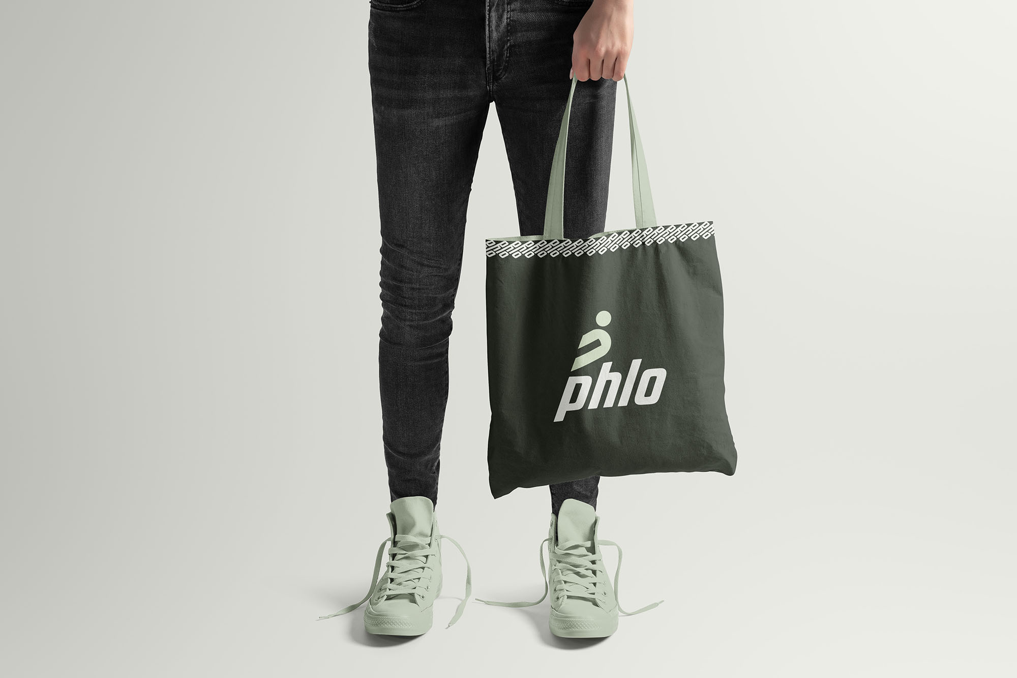 Shopping bag designed by Wotbbi for Phlo, an African activewear brand, as part of its branding project.